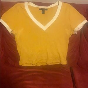 A yellow tee shirt